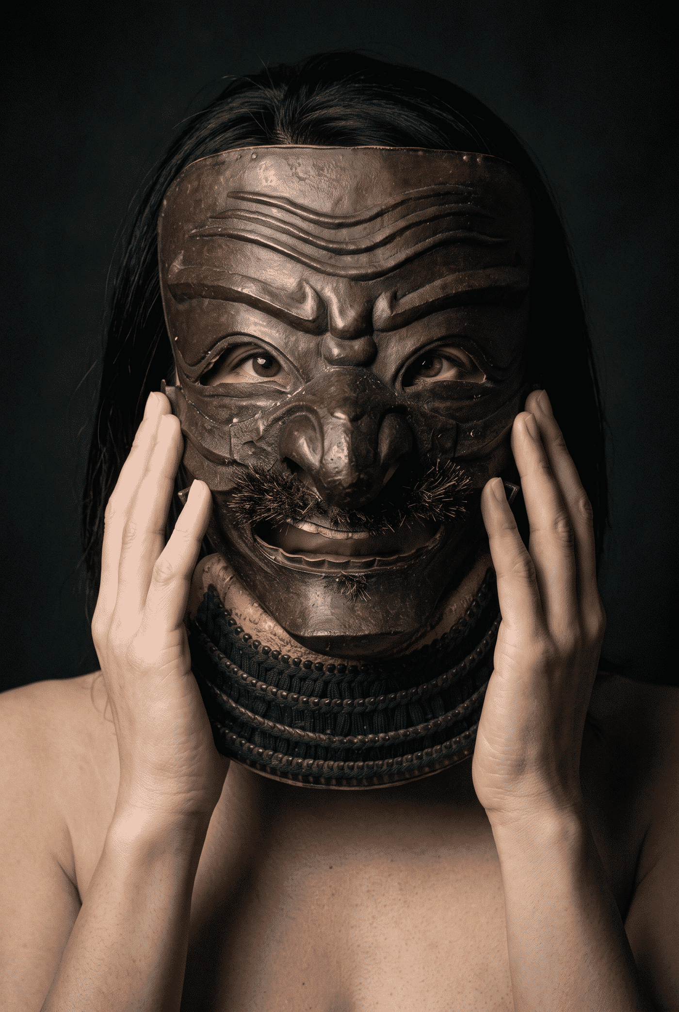Early Myōchin Sōmen russet-iron full-face Japanese armour mask